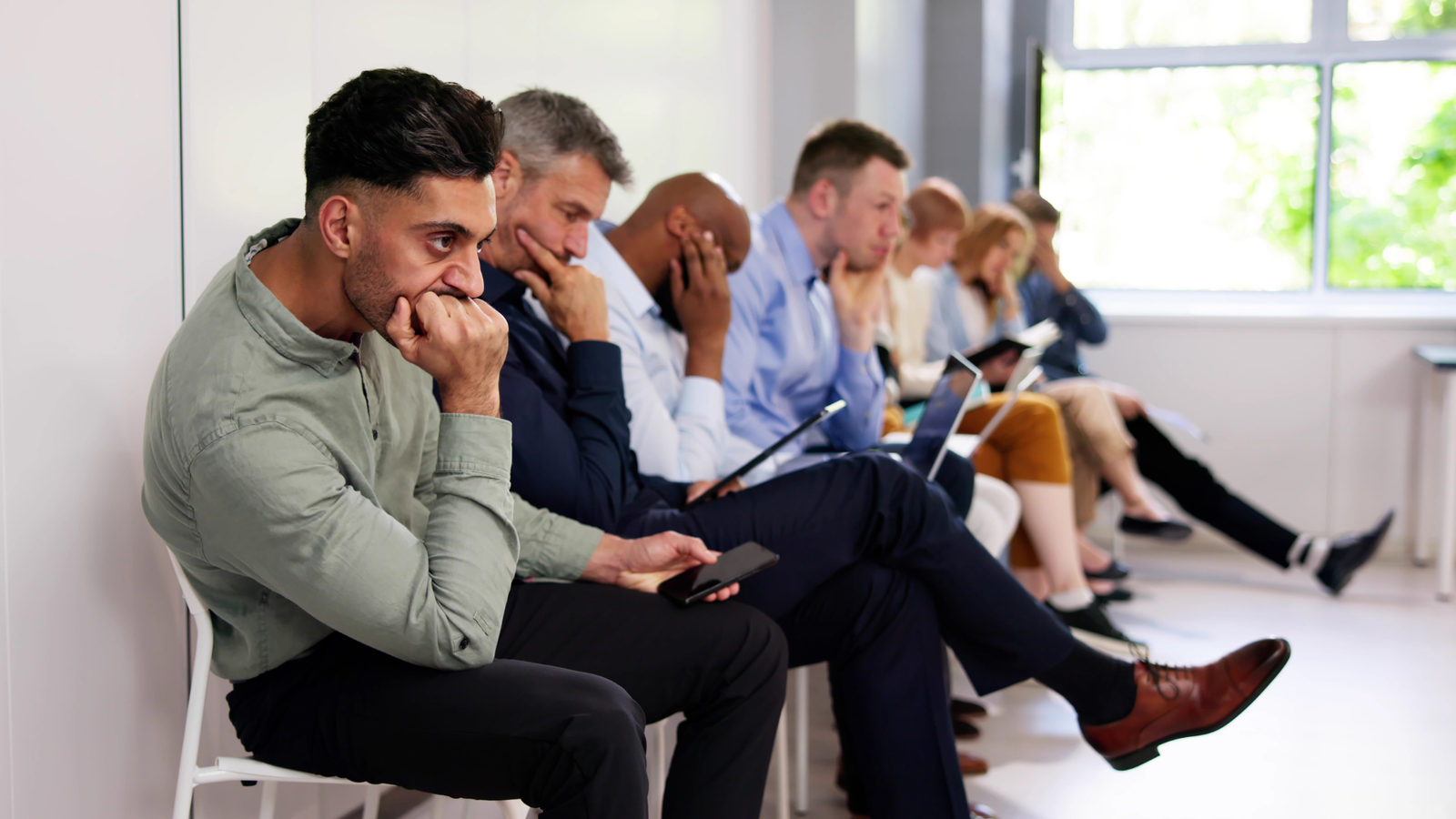 a group of people sitting in chairs